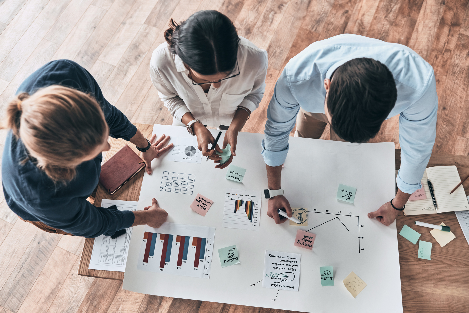 3 experts brainstorming about family business succession plan for their client