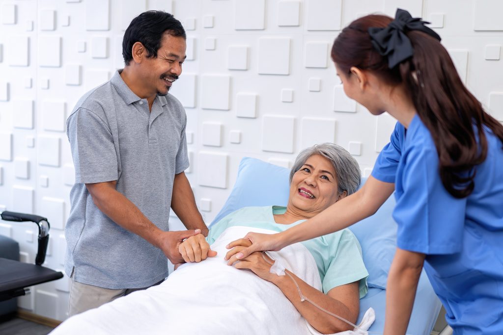 a man is accompany his mum who may need bereavement care services in future